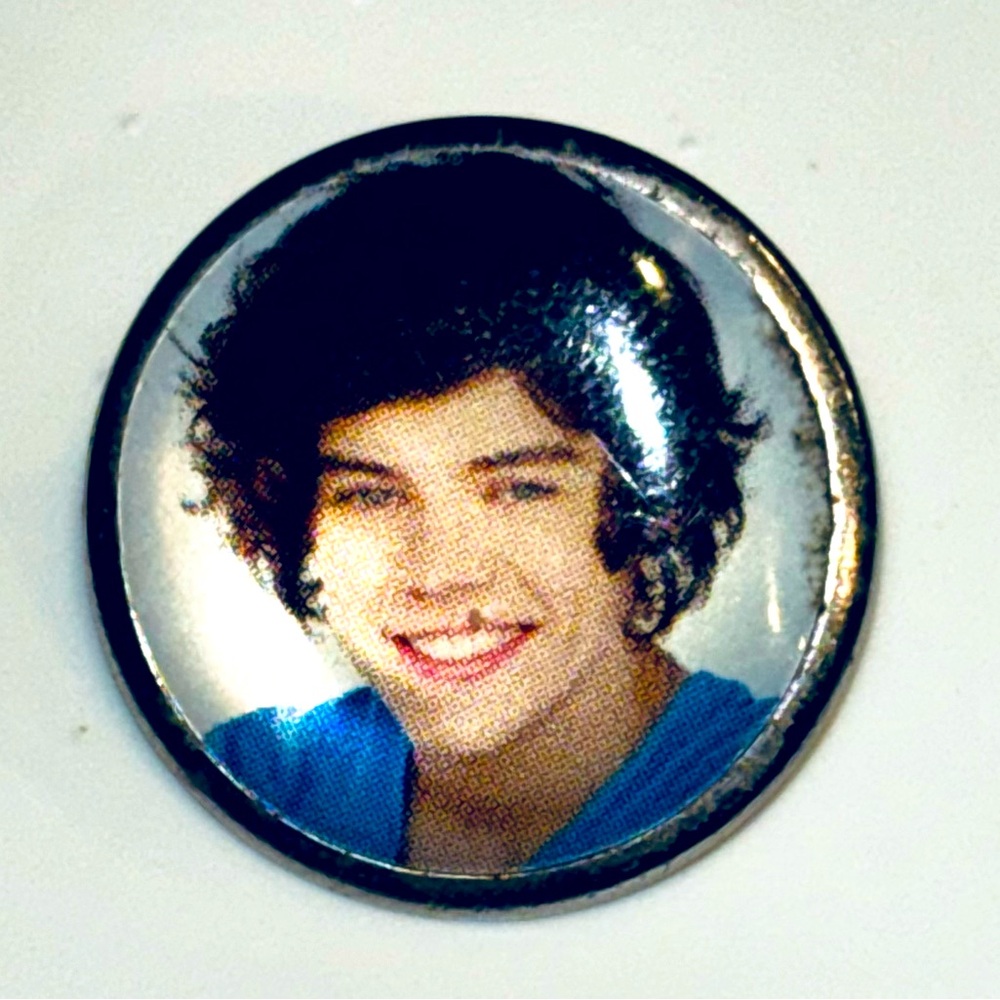 Harry Styles glossy button, quantity one, approximately size of a‎ dime.